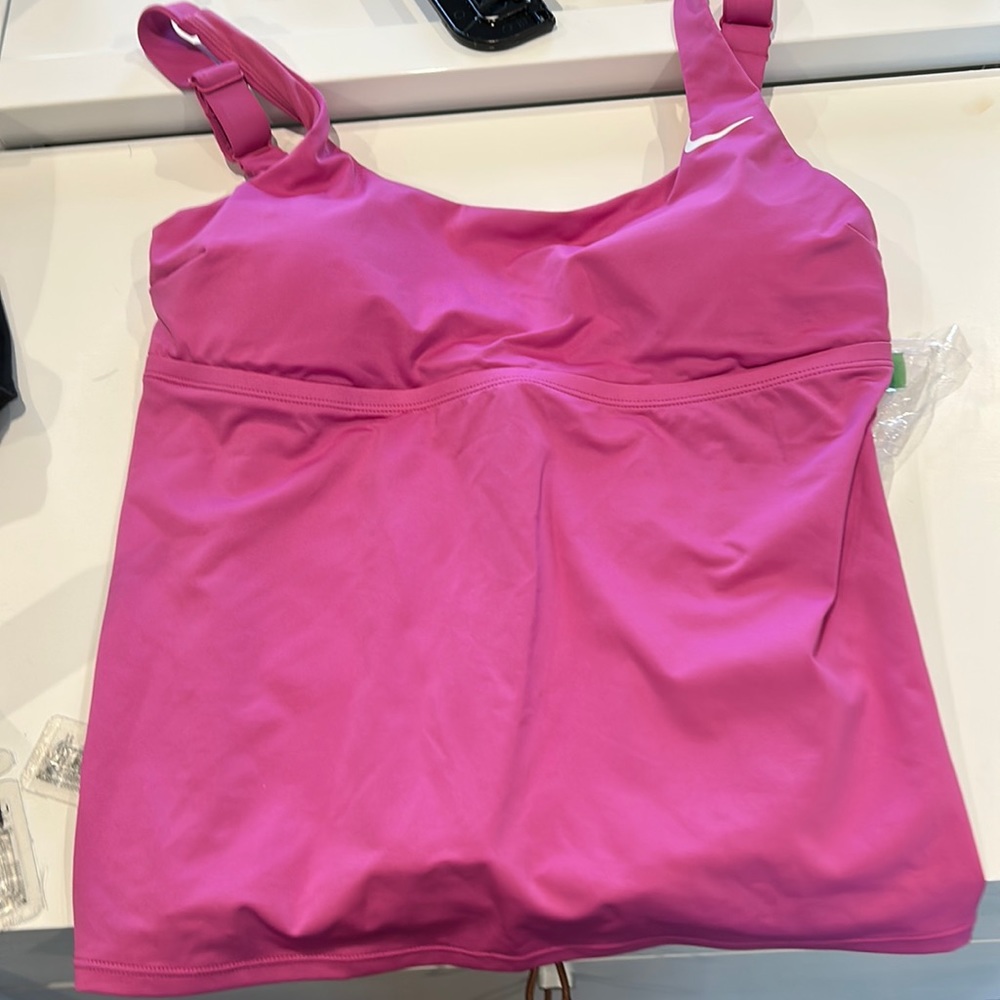 Magenta tankini from Nike. Perfect to mix and match with any bottom.